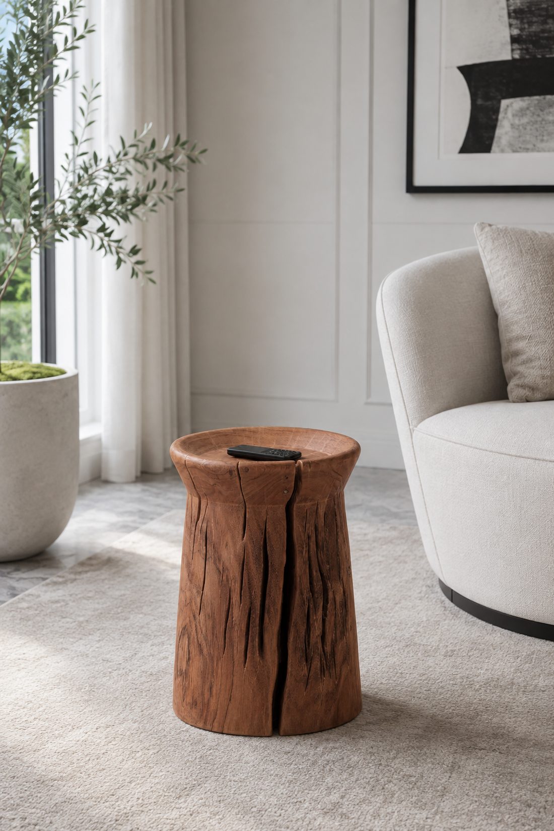 A side table worked from a single section of trunk, its natural checks left visible